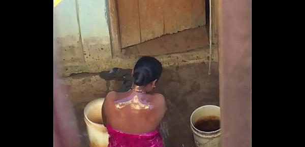  Desi village horny bhabhi nude bath show caught by hidden cam